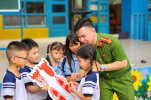 Đại úy Nguyễn Anh Quân, Báo cáo viên Phòng Cảnh sát Hình sự Công an TPHCM.