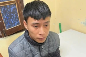 Phạm Thành Nam tại cơ quan Công an.