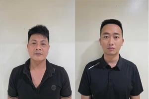 Bị can Vũ Văn Thắng và Nguyễn Đăng Long (từ trái qua).