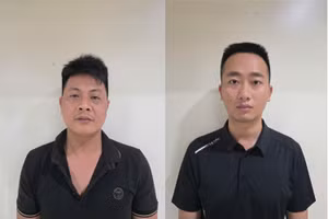 Bị can Vũ Văn Thắng và Nguyễn Đăng Long (từ trái qua).