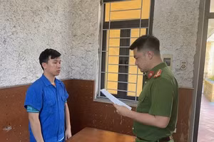 Nguyễn Quốc Tú tại cơ quan Công an.