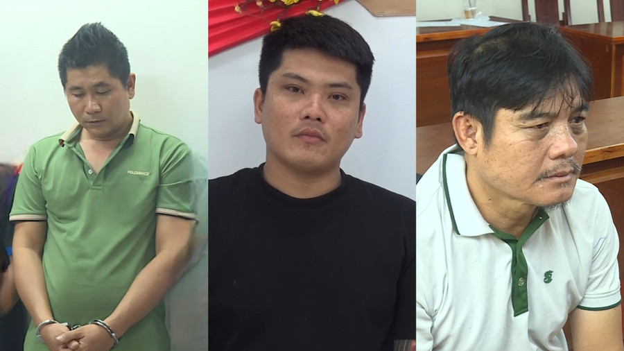 Nguyễn Thanh Hải (phải) cùng đồng phạm tại cơ quan điều tra. (Ảnh: Công an TPHCM).