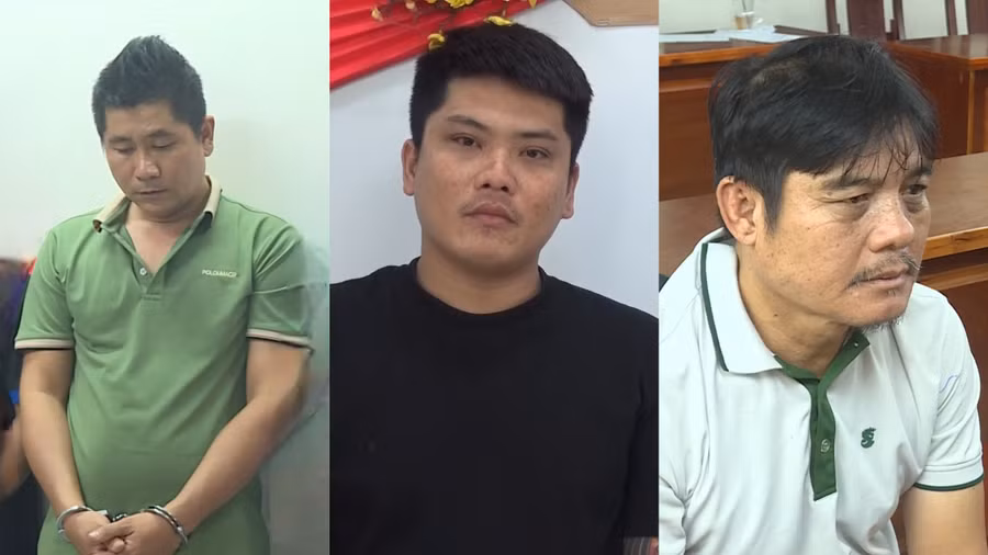 Nguyễn Thanh Hải (phải) cùng đồng phạm tại cơ quan điều tra. (Ảnh: Công an TPHCM).