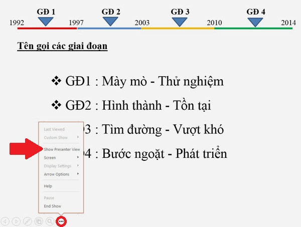 Học cách sử dụng PowerPoint 2013: Trên màn trình chiếu, tìm nút dấu “…” (khoanh đỏ) ẩn dưới thanh điều khiển rồi chọn Show Presenter View (mũi tên). A2-Huong-dan-cach-su-dung-PowerPoint-2013-5-tinh-nang-moi.jpg