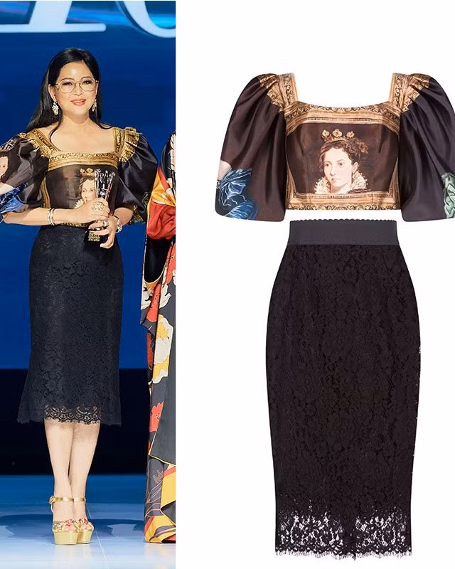 Diện cả cây đồ của Dolce&amp;Gabbana lấy cảm hứng từ phong cách hoàng tộc, mẹ chồng Tăng Thanh Hà đã thể hiện trọn vẹn sự nữ tính và quyền uy tựa nữ vương thời xưa trong set áo corset, váy ren, giày ánh kim lấp lánh.