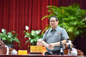 Thủ tướng Phạm Minh Chính tại buổi tiếp xúc cử tri ngành GD&ĐT và ngành Y tế trên địa bàn TP Cần Thơ. Ảnh: V Dương.