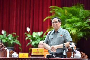 Thủ tướng Phạm Minh Chính tại buổi tiếp xúc cử tri ngành GD&ĐT và ngành Y tế trên địa bàn TP Cần Thơ. Ảnh: V Dương.