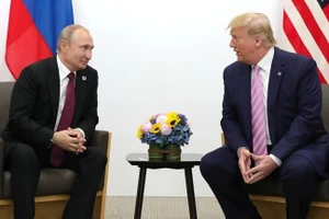 Tổng thống Nga Vladimir Putin (trái) và cựu Tổng thống Mỹ Donald Trump.