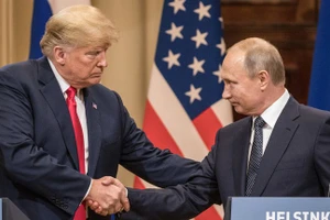 Tổng thống đắc cử Mỹ Donald Trump (trái) và Tổng thống Nga Vladimir Putin.