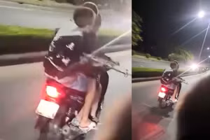 Nhóm thanh thiếu niên cầm theo dao, súng chạy xe máy chở 3 trên các tuyến đường TP Huế. (Ảnh: CACC)