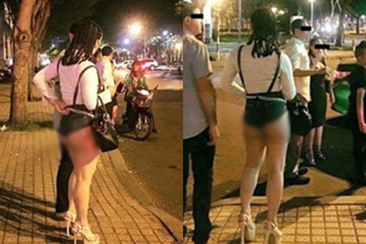 Cô gái mặc quần soóc lộ nguyên vòng 3 trên phố