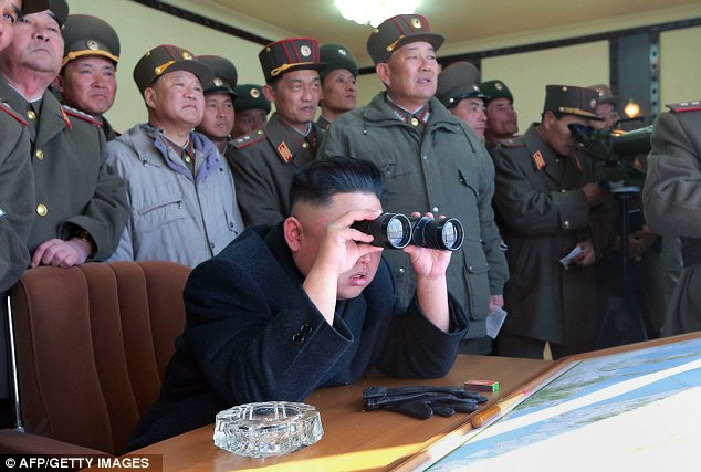 Supervising: North Korea’s latest drill was overseen by dictator Kim Jong Un, pictured with his generals Read more: http://www.dailymail.co.uk/news/article-2293200/North-Korea-uses-live-artillery-drills-near-border-Kim-Jong-Un-continues-threats.html#ixzz2NWar0nLt Follow us: @MailOnline on Twitter | DailyMail on Facebook