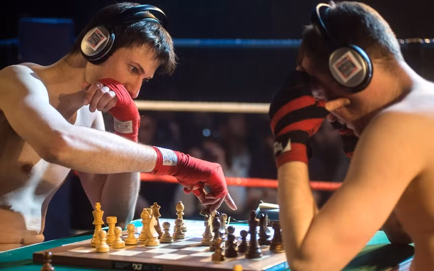 Matt Read (L) and Chris Levy compete in a bout of chessboxing during a competition at the Scala venue in London. The hybrid sport combines chess with boxing in alternating rounds. The winner is decided by a knock out or checkmate, whichever comes first. A full match consists of eleven rounds: six rounds of chess, each four minutes long, and five rounds of boxing, each three minutes long.