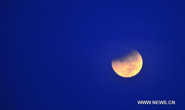 A partial lunar eclipse is seen in Conakry, Guinea