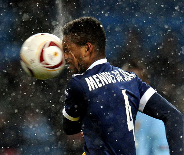 FC Red Bull Salzburg’s midfielder David Mendes da Silva is hit in the face with the ball during the UEFA Europa League group A football match against Manchester City at The City of Manchester stadium