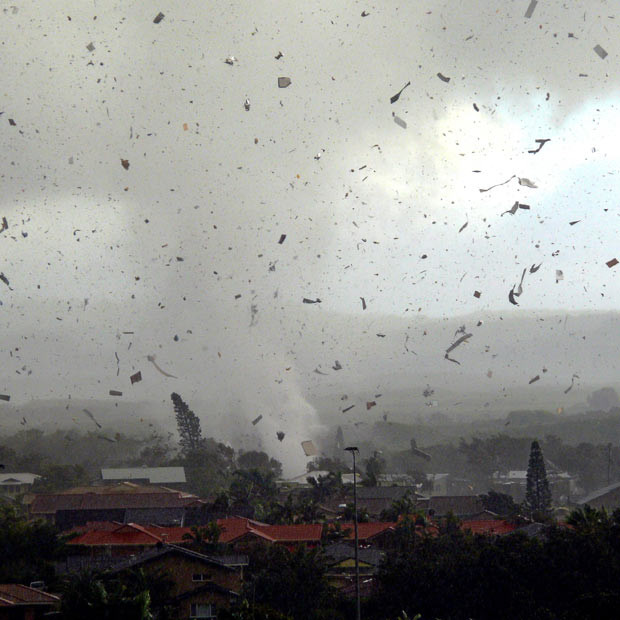 Những thảm họa thiên nhiên, một năm nhìn lại ảnh 12 Debris flies through the air as a freak tornado tears through the coastal town of Lennox Head in New South Wales, Australia. The storm levelled 12 homes and damaged another 30, with twisting winds carving out a 300 metre-wide path of destruction, injuring six people and leaving thousands without power