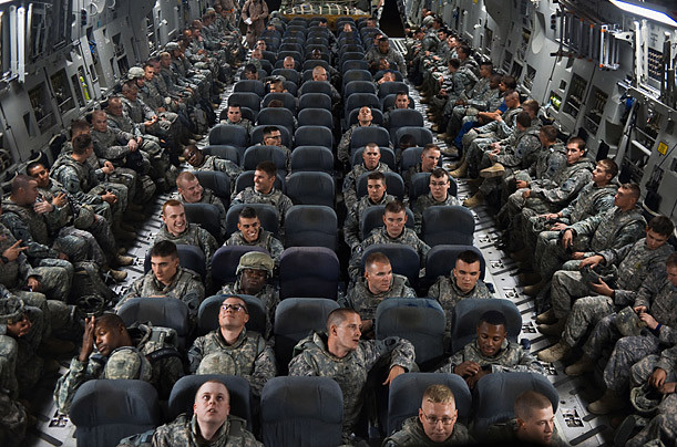 Iraq War U.S. Troop Drawdown Photographed by Yuri Kozyrev / NOOR for TIME Soldiers from the Virginia National Guard’s 1st Battalion, 116th Infantry await takeoff in the plane that will bring them home. Read more: http://www.time.com/time/photogallery/0,29307,2036245,00.html#ixzz18Zm3rby9