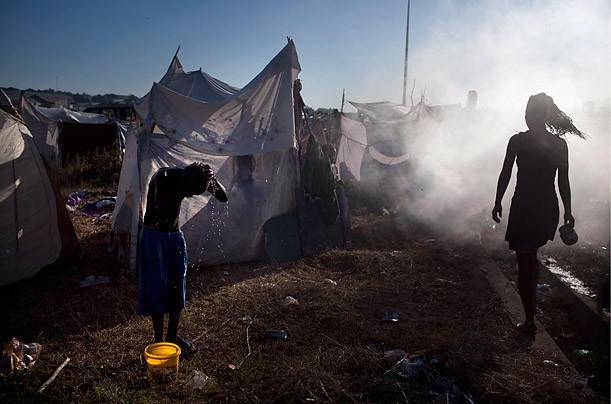 Earthquake in Haiti Photographed by Shaul Schwarz / Reportage / Getty Images for TIME Haitians try to restart their lives as they settle into temporary shelter at a refugee camp in Port-au-Prince on Jan. 18. Read more: http://www.time.com/time/photogallery/0,29307,2036245,00.html#ixzz18ZjgWEC1