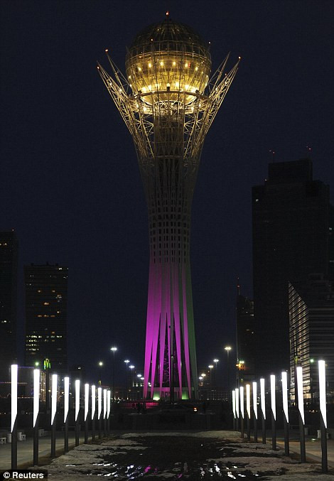 The 97-metre monument Baiterek before and during Earth Hour in Kazakhstan