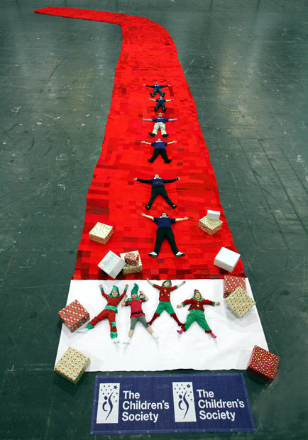 The largest Christmas stocking measured 32.56 m (106 ft 9 in) long and 14.97 m (49 ft 1 in) wide (heel to toe) and was made by the Children’s Society (UK) in London, on 14 December 2007.