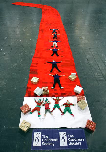 The largest Christmas stocking measured 32.56 m (106 ft 9 in) long and 14.97 m (49 ft 1 in) wide (heel to toe) and was made by the Children’s Society (UK) in London, on 14 December 2007.