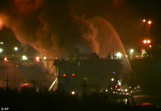 Smoke rises from the dock where the Yekaterinburg was being repaired today Read more: http://www.dailymail.co.uk/news/article-2079908/Blaze-breaks-Russian-nuclear-submarine-docked.html#ixzz1hz3D1gO6