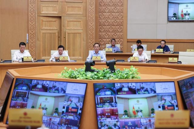 Các đại biểu tham dự tại điểm cầu trụ sở Chính phủ - Ảnh: VGP/Nhật Bắc.