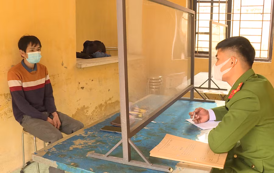 Đối tượng Nguyễn Văn Huy làm việc với cơ quan công an.