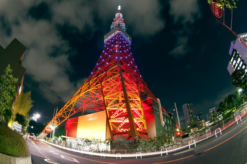 Tokyo Tower is illuminated in Olympic colours after a parade by Japan’s Olympians and medallists