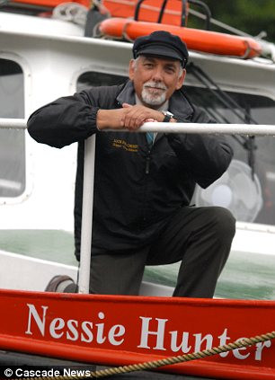 George, left, says he has even had the picture independently verified by a team of US military monster experts as well as a Nessie sighting specialist Read more: http://www.dailymail.co.uk/news/article-2183094/Skipper-claims-finally-proof-Loch-Ness-Monster-exists.html#ixzz22Xu8irE9