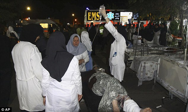 The earthquake claimed the lives of at least 87 people and injured more than 600; doctors tend to an injured woman in Varzaqan Read more: http://www.dailymail.co.uk/news/article-2187105/Earthquake-hits-Iran-killing-87-injuring-600-villages-totally-demolished.html#ixzz23INNtyWN
