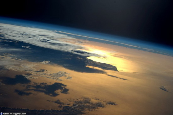 Indian Ocean Maldives “The sunny side of life” is a catchphrase used to attract tourists to the Maldive Islands. Well it certainly looks heavenly from the ISS. Time to order a large drink, you know, one with a lot of fruit and a little umbrella, then stretch out on a hammock and just enjoy life, watching what I can only imagine a marvelous sunset. Image Credit: NASA/ESA 