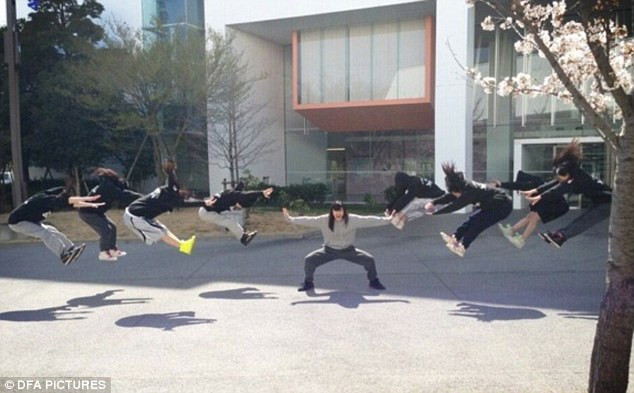 Web craze: Dozens of pictures like this one have turned up on Twitter in the last two weeks of Japanese teenagers recreating Dragon Ball moves Read more: http://www.dailymail.co.uk/news/article-2302955/Japanese-teenagers-upload-pictures-Dragon-Ball-attacks-bizarre-new-craze-sweeping-web.html#ixzz2PPkBWvZW Follow us: @MailOnline on Twitter | DailyMail on Facebook