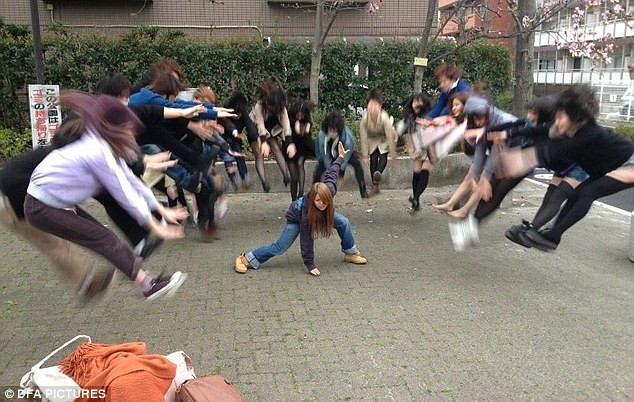 Japanese children unleash the Kamehameha attack made famous by the 1980s Dragon Ball series in a bizarre picture posted online Read more: http://www.dailymail.co.uk/news/article-2302955/Japanese-teenagers-upload-pictures-Dragon-Ball-attacks-bizarre-new-craze-sweeping-web.html#ixzz2PPk1riaw Follow us: @MailOnline on Twitter | DailyMail on Facebook