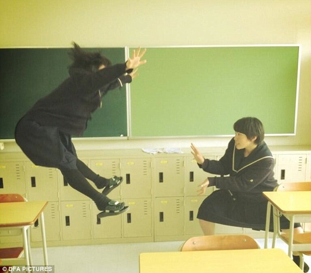 Mid-air: The craze has taken off just a month before the first Dragon Ball film in 17 years is released in Japanese cinemas Read more: http://www.dailymail.co.uk/news/article-2302955/Japanese-teenagers-upload-pictures-Dragon-Ball-attacks-bizarre-new-craze-sweeping-web.html#ixzz2PPkOWUwM Follow us: @MailOnline on Twitter | DailyMail on Facebook