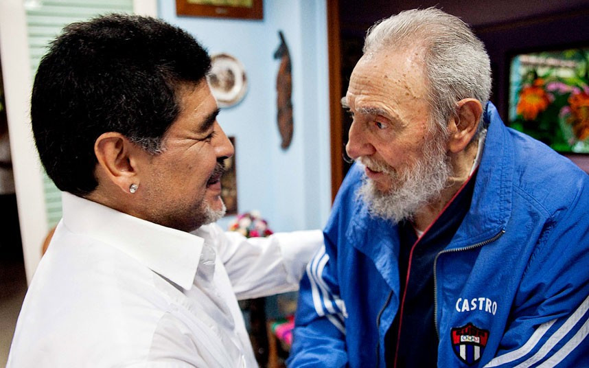 Cuba’s Fidel Castro shakes hands with former soccer star Diego Maradona in Havana, Cuba