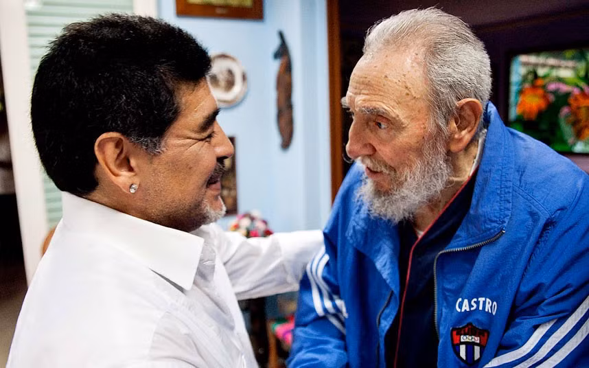 Cuba’s Fidel Castro shakes hands with former soccer star Diego Maradona in Havana, Cuba