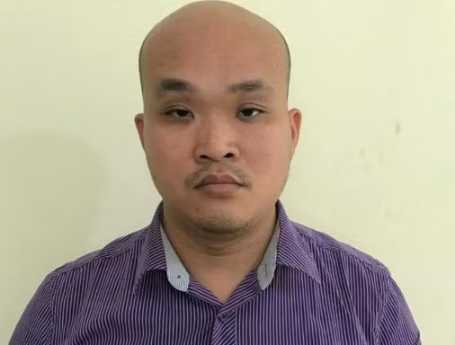 Lê Anh Tuấn tại cơ quan công an.