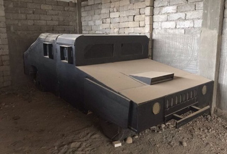 IS dung xe quan su gia bang go nham 