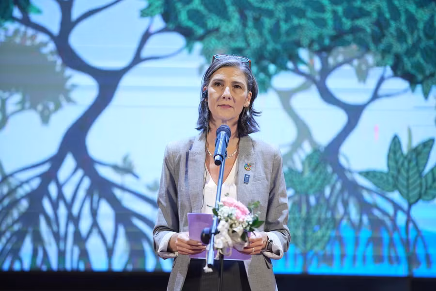 Bà Ramla Al Khalidi phát biểu khai mạc.