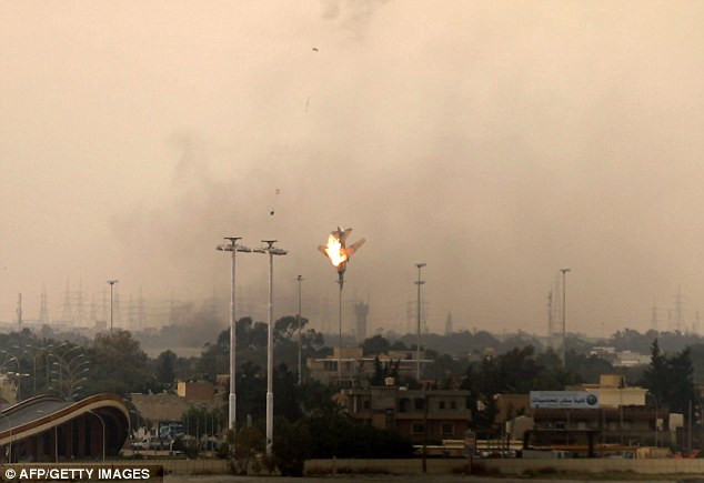 The jet is almost vertical as it plummets to the ground at high speed. It is not known if the pilot survived Read more: http://www.dailymail.co.uk/news/article-1367800/Libya-Rebels-shoot-fighter-jet-Gaddafis-forces-break-ceasefire.html#ixzz1H3rAQfHw