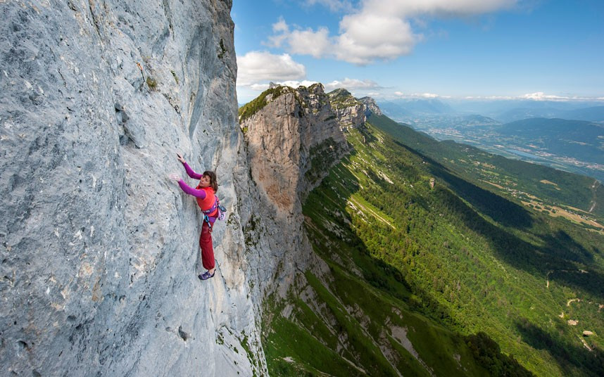 Nina Caprez scales the near vertical 820ft wall of La Dent de Crolles with just a thin rope keeping her from plunging to the ground. Nina Caprez spent seven hours scaling the tricky route up the huge slab of rock - dubbed Carnet d’Adresses - found in the Chartreuse Massif, near Grenoble, France. The climb is so steep it has been likened to climbing glass, with few holds for climbers to cling onto. It has meant that only four people - including Nina - have ever successfully free climbed the peak.