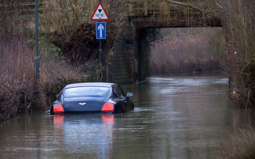 A lottery winner’s luck ran out when he wrote off his £100,000 Bentley Continental by trying to drive through flood waters. Robert Johnson, 65, bought his Bentley three years ago after winning £5million in 2008. But he was forced to ditch his pride and joy when he drove through flood water in Tewkesbury, Gloucestershire, on Wednesday. 