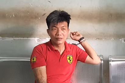 Trần Gia Đức tại cơ quan chức năng. Ảnh: T.L.