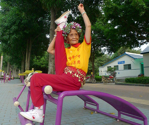 A 72-year-old pensioner shows off her flexibility in a park in Nanning, capital of southern China’s Guangxi Province. According to Tan Zhaoxian her incredible flexibility is thanks to the morning exercises she has done every day since she retired.