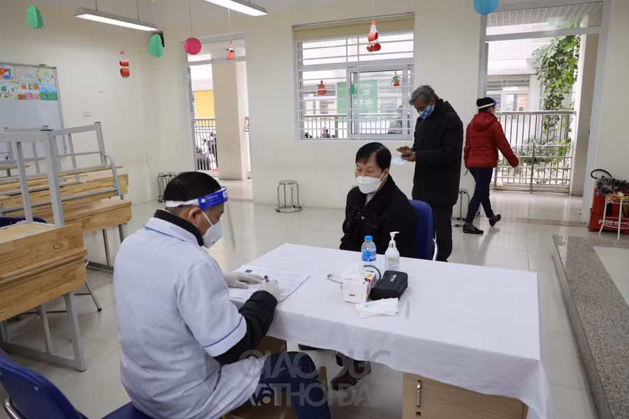 Hà Nội: Triển khai tiêm vắc xin Covid-19 mũi 3 cho người dân ảnh 5