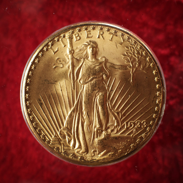 A ’Double Eagle’ gold twenty dollar coin is displayed at Goldsmith’s Hall in London. Nearly half a million of these coins were originally minted in the middle of the Great Depression in the US. Only 13 are known today after the rest were melted down before they ever left the US Mint, sacrificed as part of a strategy to stabilise the American economy. In 2002 a Double Eagle sold at auction for $7.6 million.