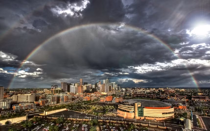 A double rainbow arches over Denver, Colorado in this picture captured by amateur photographer Greg Thow, 47. He rushed up 20 flights of stairs of an observation tower to bag the photo. He says: 
