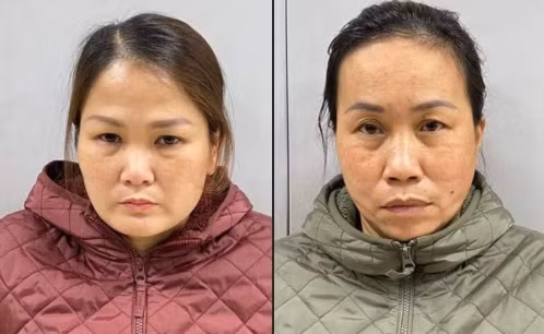 Trần Thanh Hiếu (trái) và Lương Ngọc Loan tại cơ quan công an.