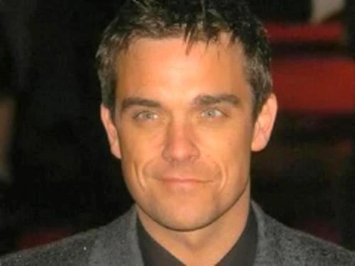 Robbie William ước trẻ lại để gia nhập nhóm One Direction